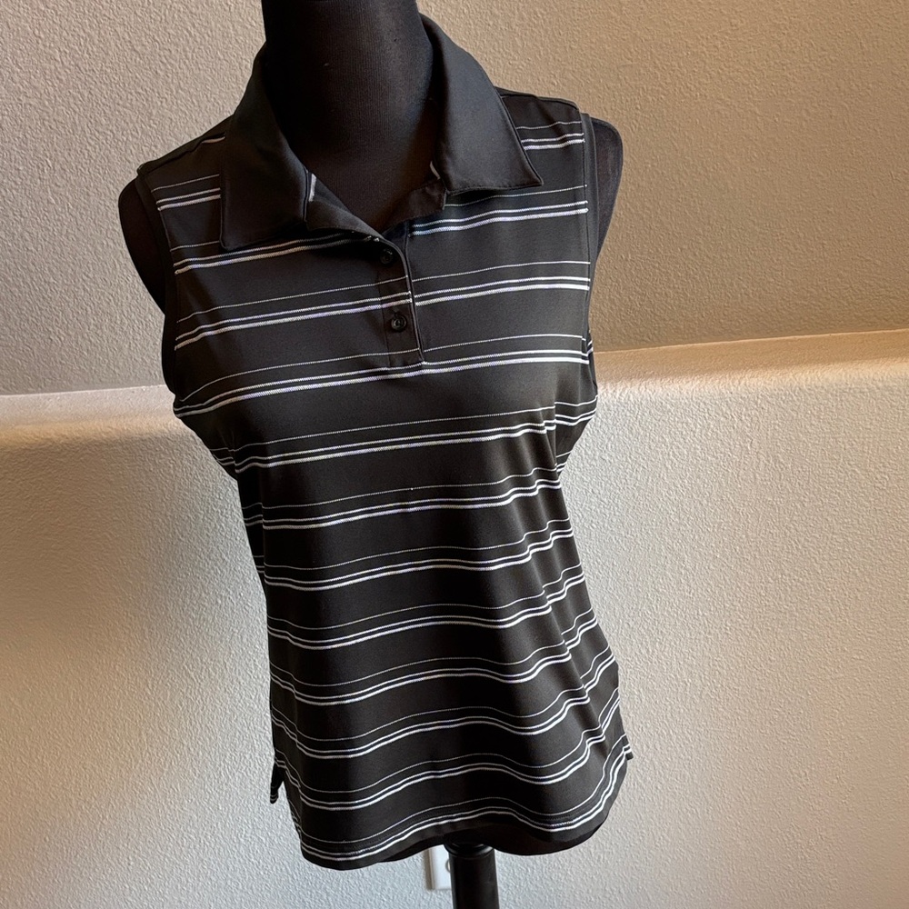 Adidas golf sleeveless black with white stripes 
Size M